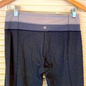 Grey, reversible Lululemon mid-rise, flare leggings / pants, size 8.